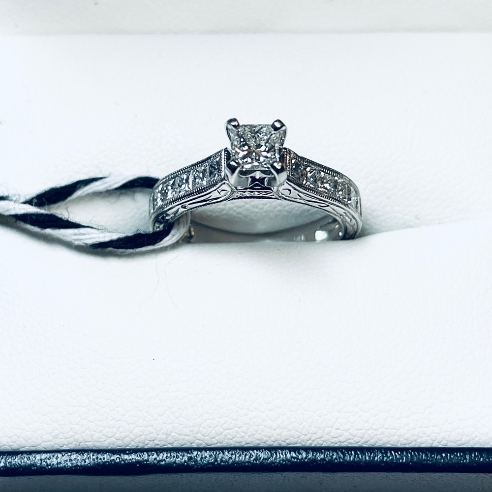 Brand New 14kw Princess Cut Engagement Ring. Carat weight is .66ctw VS-SI G-H